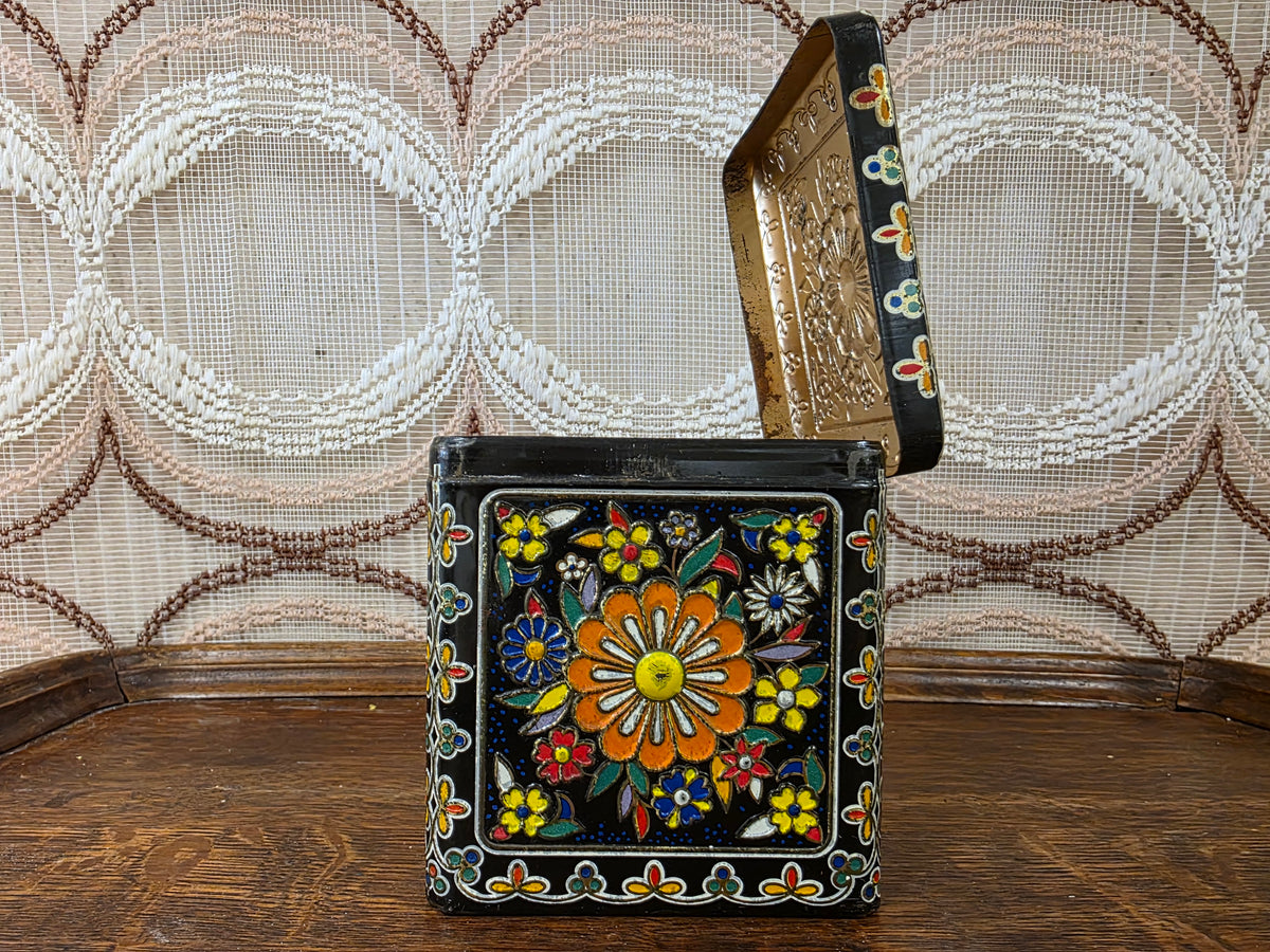 Vintage zwart bloemenblik kleurrijk decor