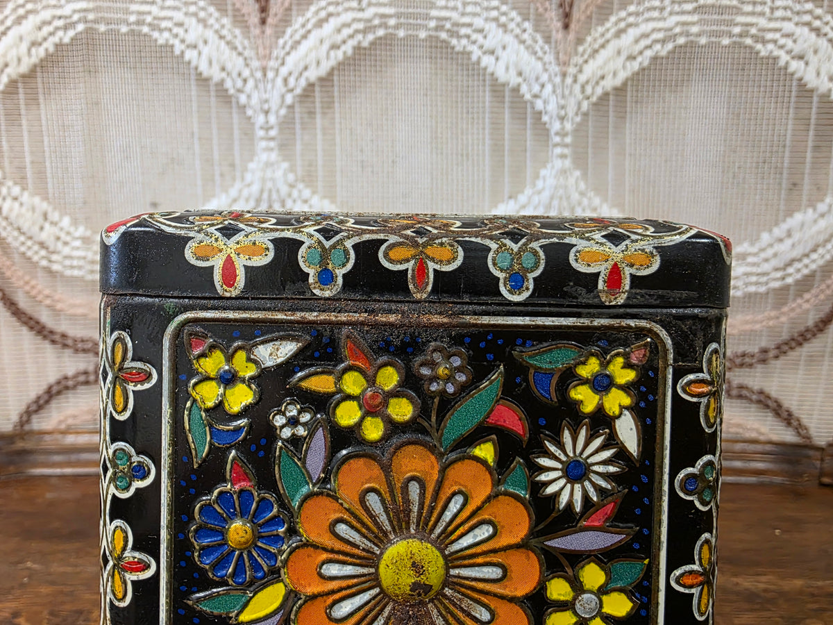Vintage zwart bloemenblik kleurrijk decor