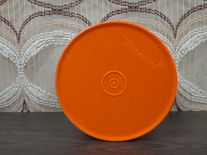 Tupperware oranje voorraadbus met bloemmotief 9 x 14