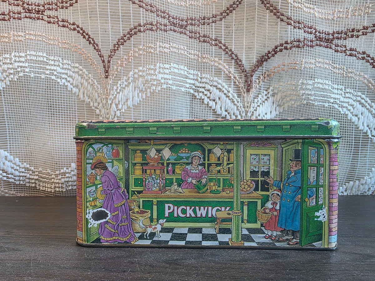 Pickwick theeblik met afbeeldingen van een theewinkel