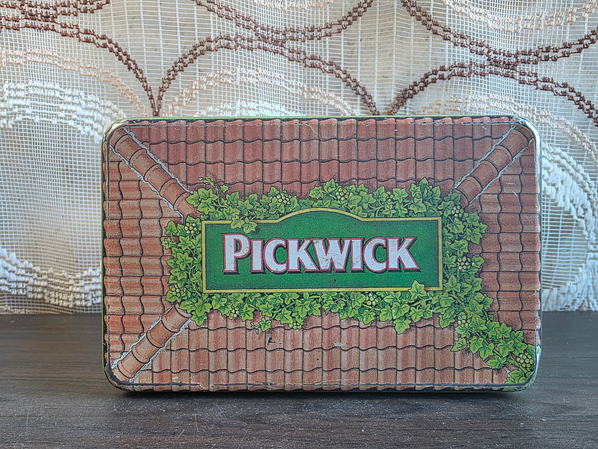 Pickwick theeblik met afbeeldingen van een theewinkel