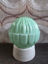 Thabur plafondlamp met mintgroene glazen bol en wit armatuur
