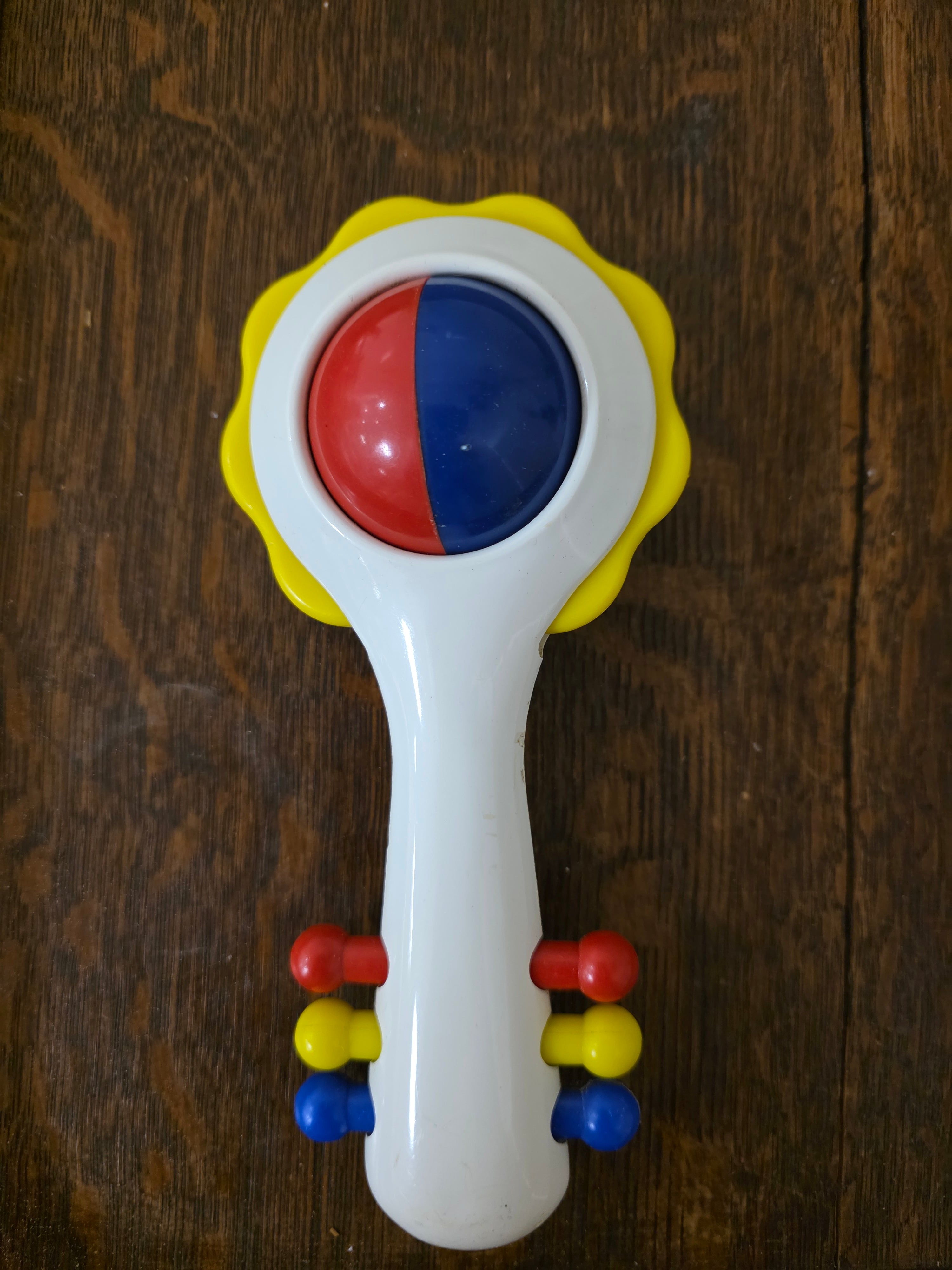 Ambi Toys rammelaar in rood blauw geel wit circa 18 cm