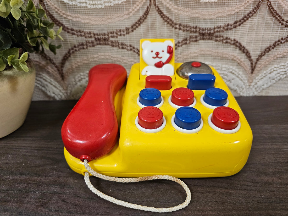 Ambi Toys vintage speelgoedtelefoon met gekleurde knoppen