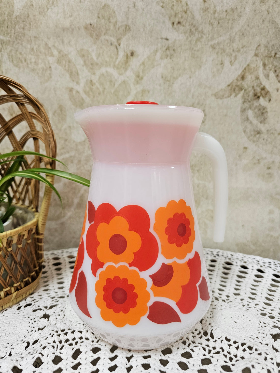 Arcopal Lotus kan met oranje rode bloemen