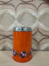 Vintage Brabantia Diane blik in oranje met bloemenmotief