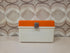 Oranje witte vintage naaibox met losse inzet voor naaigaren en opbergvakjes
