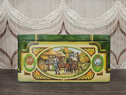 Vintage metalen Pickwick theeblik met groene illustratie en klassiek tafereel