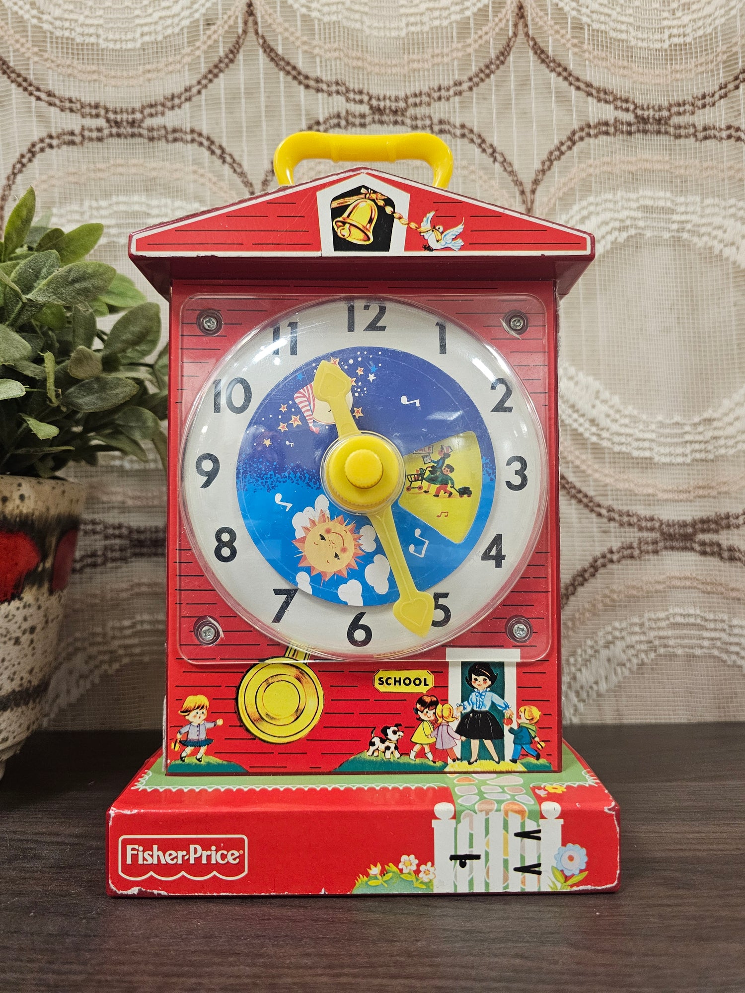 Fisher Price Music Box Teaching Clock vintage jaren 70 met muziek en illustraties