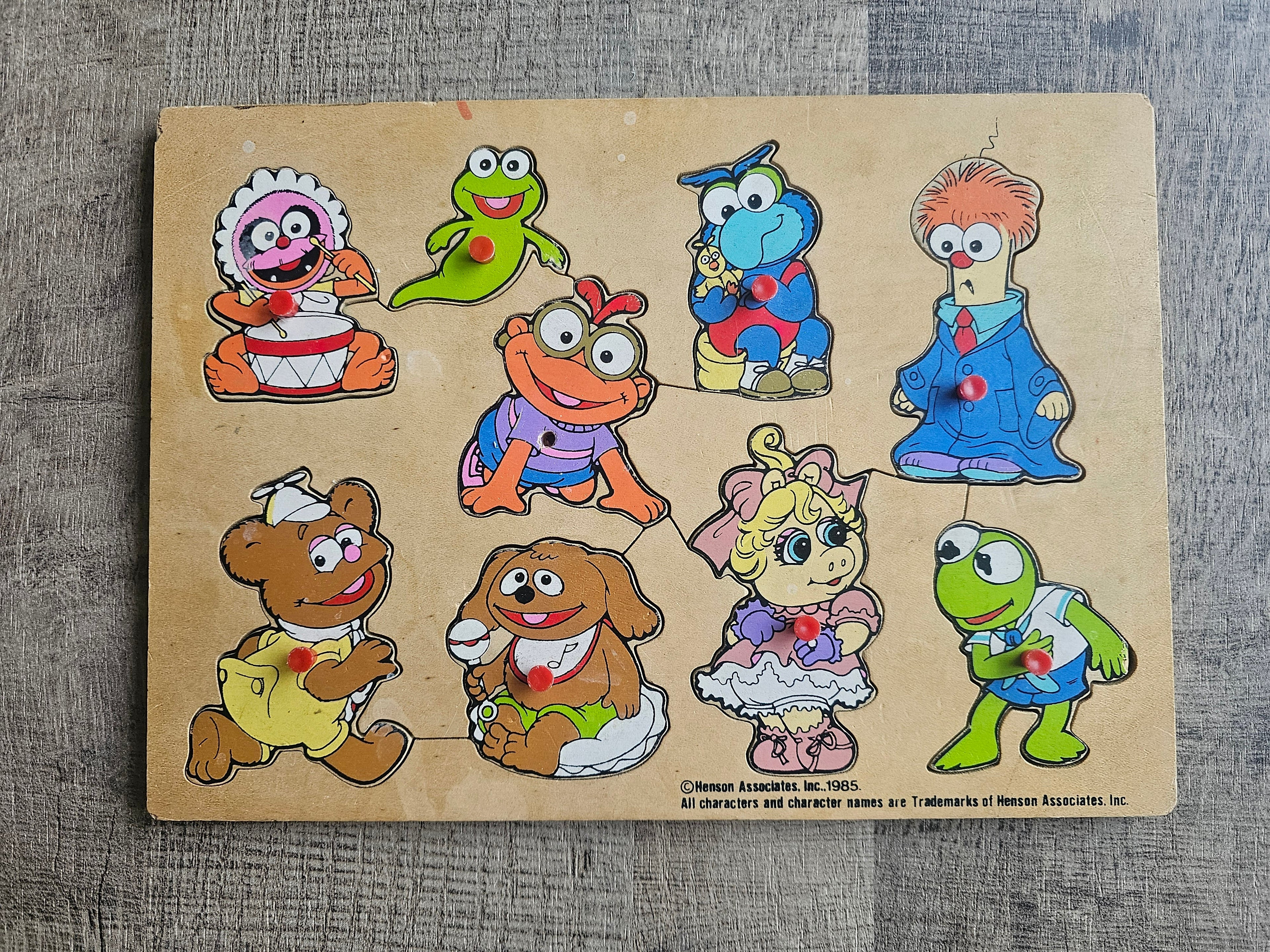 Houten puzzel uit 1985 met Mini Muppets figuren zoals Kermit en Miss Piggy