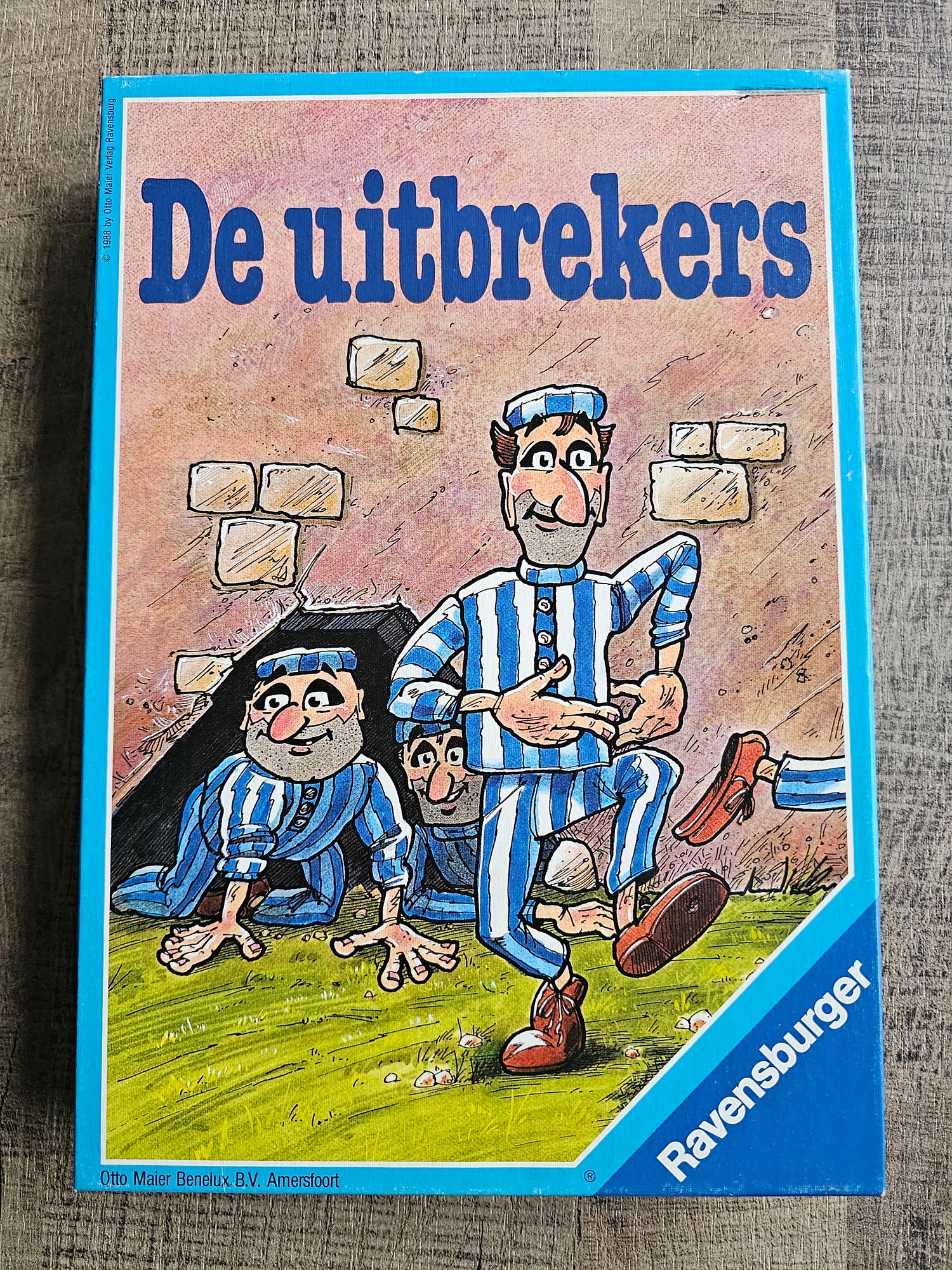 De Uitbrekers bordspel van Ravensburger met boeven en boten, achterkant doos met spelregels