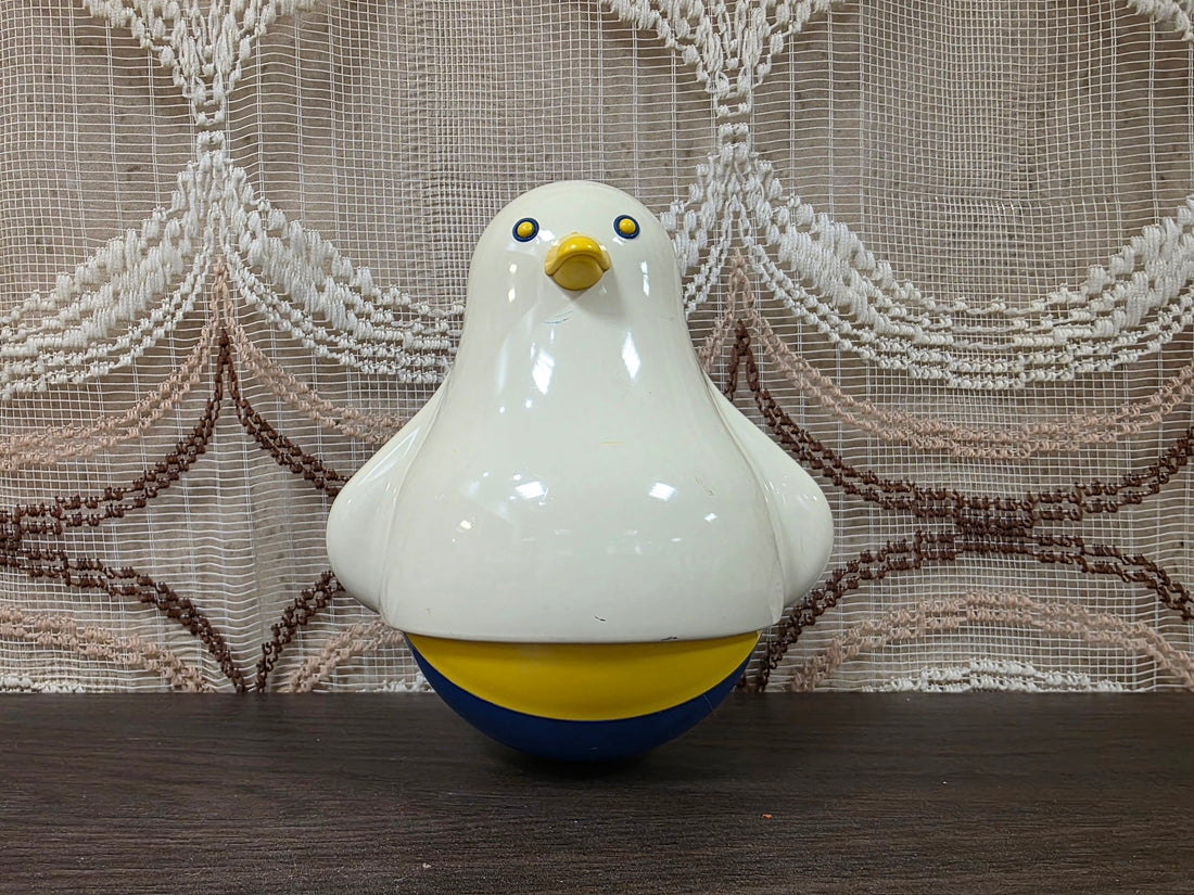 Ambi Toys Roly Poly Penguin tuimelaar in wit blauw en geel met originele Made in Holland sticker