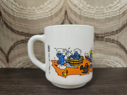 Arcopal beker met Smurfen op het strand 1985