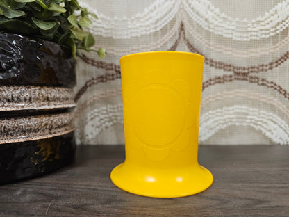 Lichtoranje vintage Tupperware peuterbeker van kunststof met bloemprint – zonder deksel