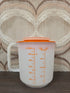 Vintage Tupperware maatbeker 1,2 liter in oranje kunststof met deksel