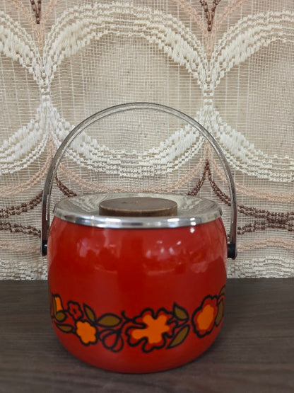 Vintage oranje ijsemmer met bloemendecor, metalen hengsel en houten knop