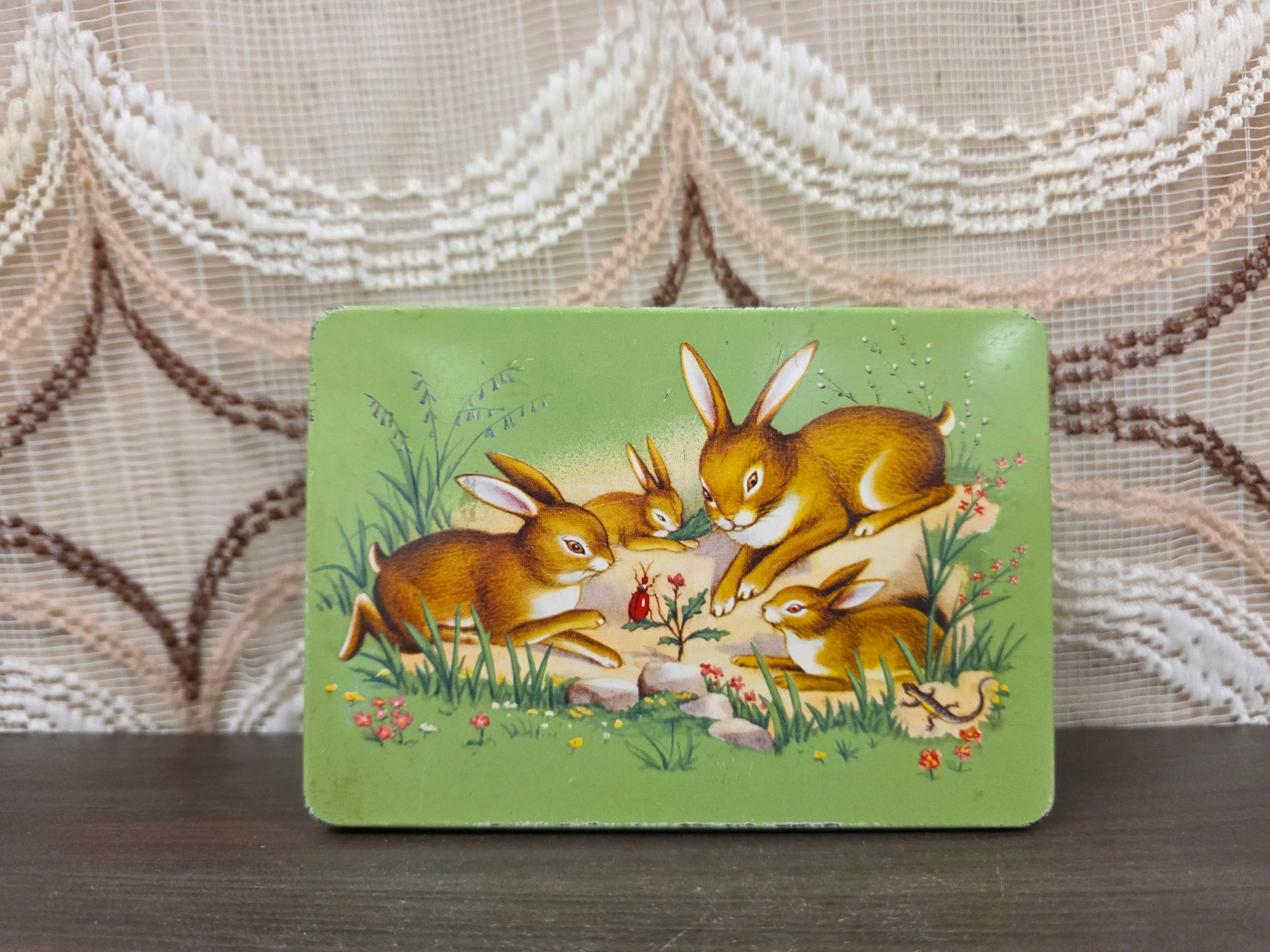 Vintage metalen blik met konijnen illustratie groen