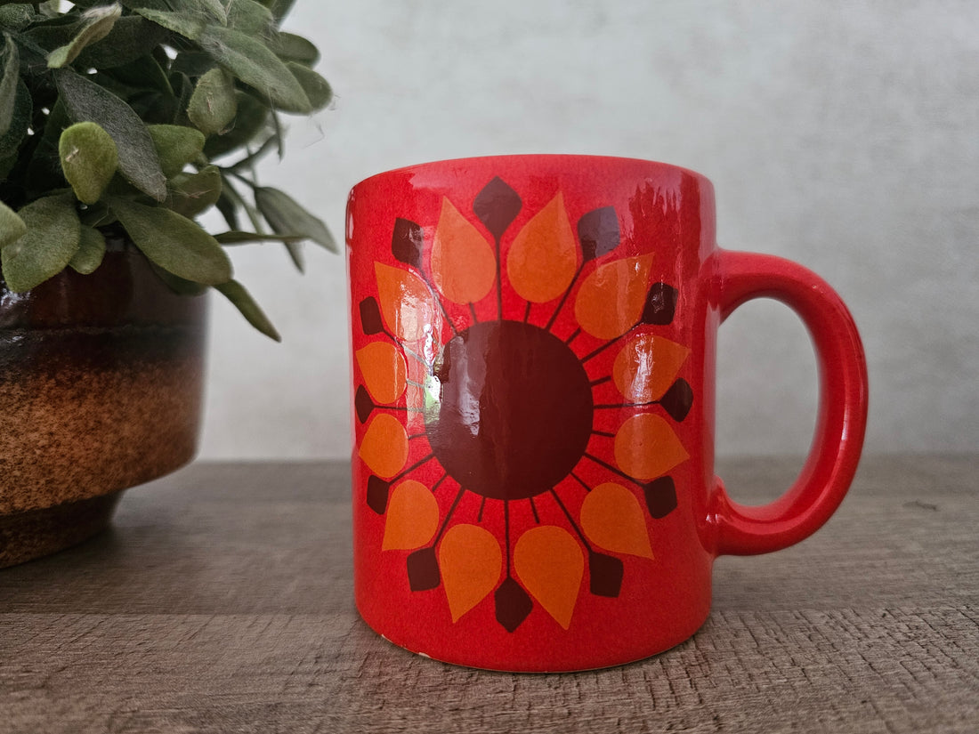 Vintage oranje beker met bloem jaren 70