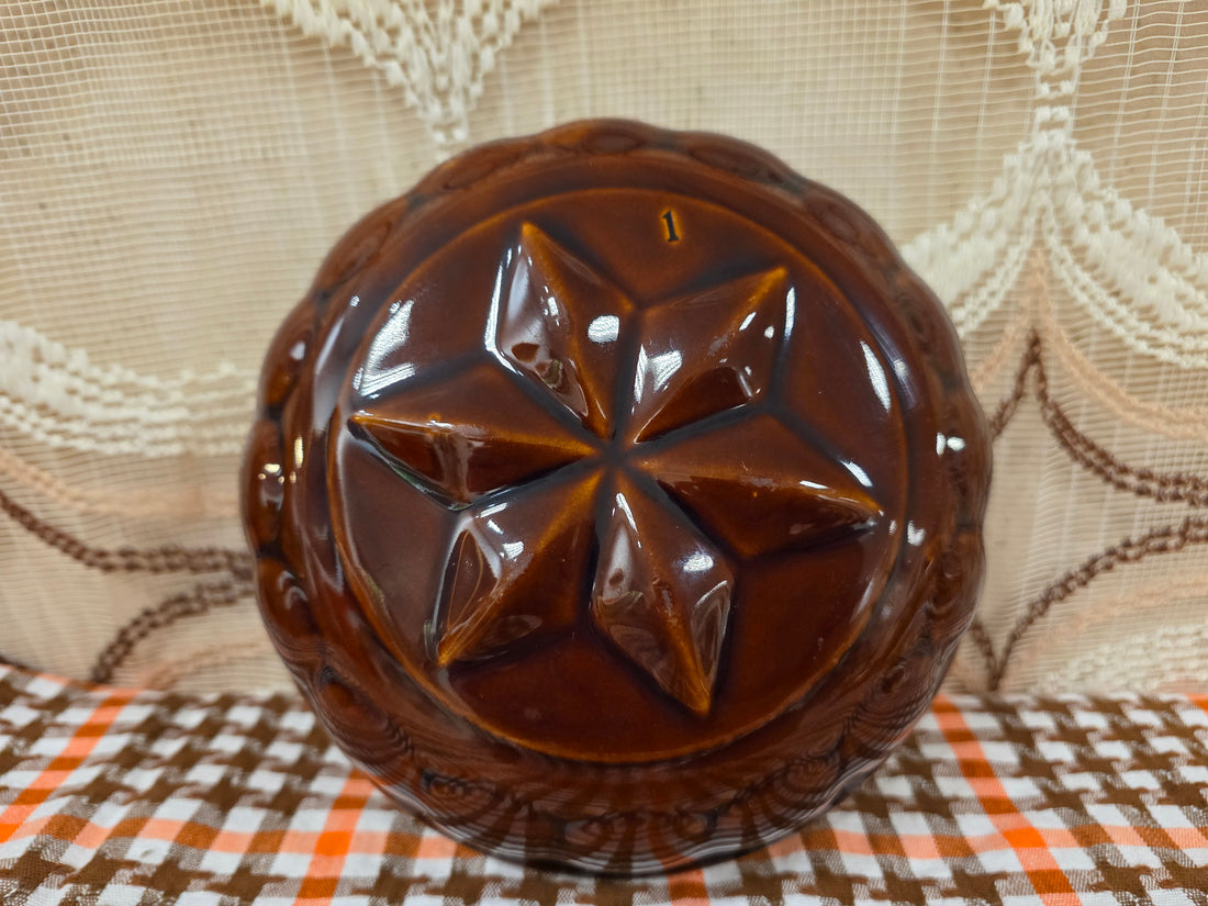 Vintage keramieken puddingvorm bruin stervorm 19 cm
