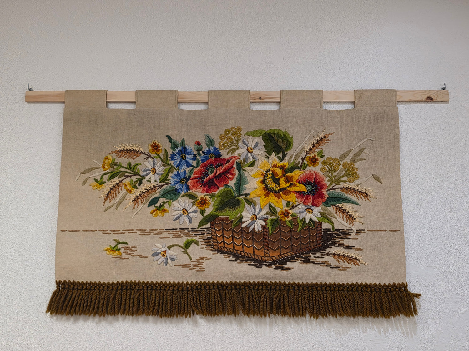 Vintage wandkleed met bloemenprint en bruine franjes
