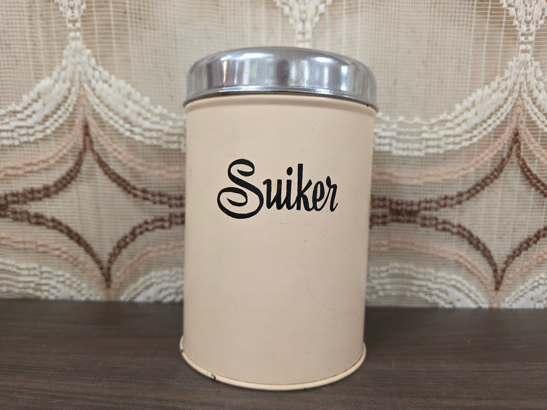 Crèmekleurig Brabantia suikerblik met zwarte letters en metalen deksel