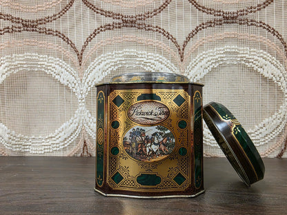 Pickwick theeblik van Douwe Egberts met deksel ernaast, opening en koetsmotief