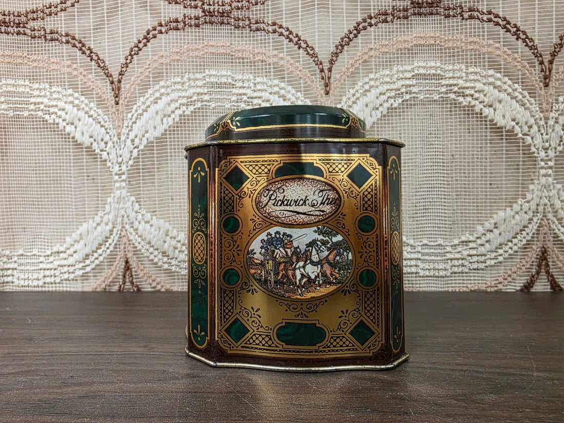 Groen-gouden Douwe Egberts Pickwick theeblik met koets en paarden, voorzijde