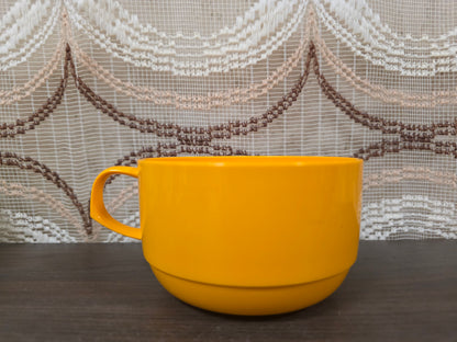 Vintage oranje Mepal soepkop nr. 418 van melamine met handvat.
