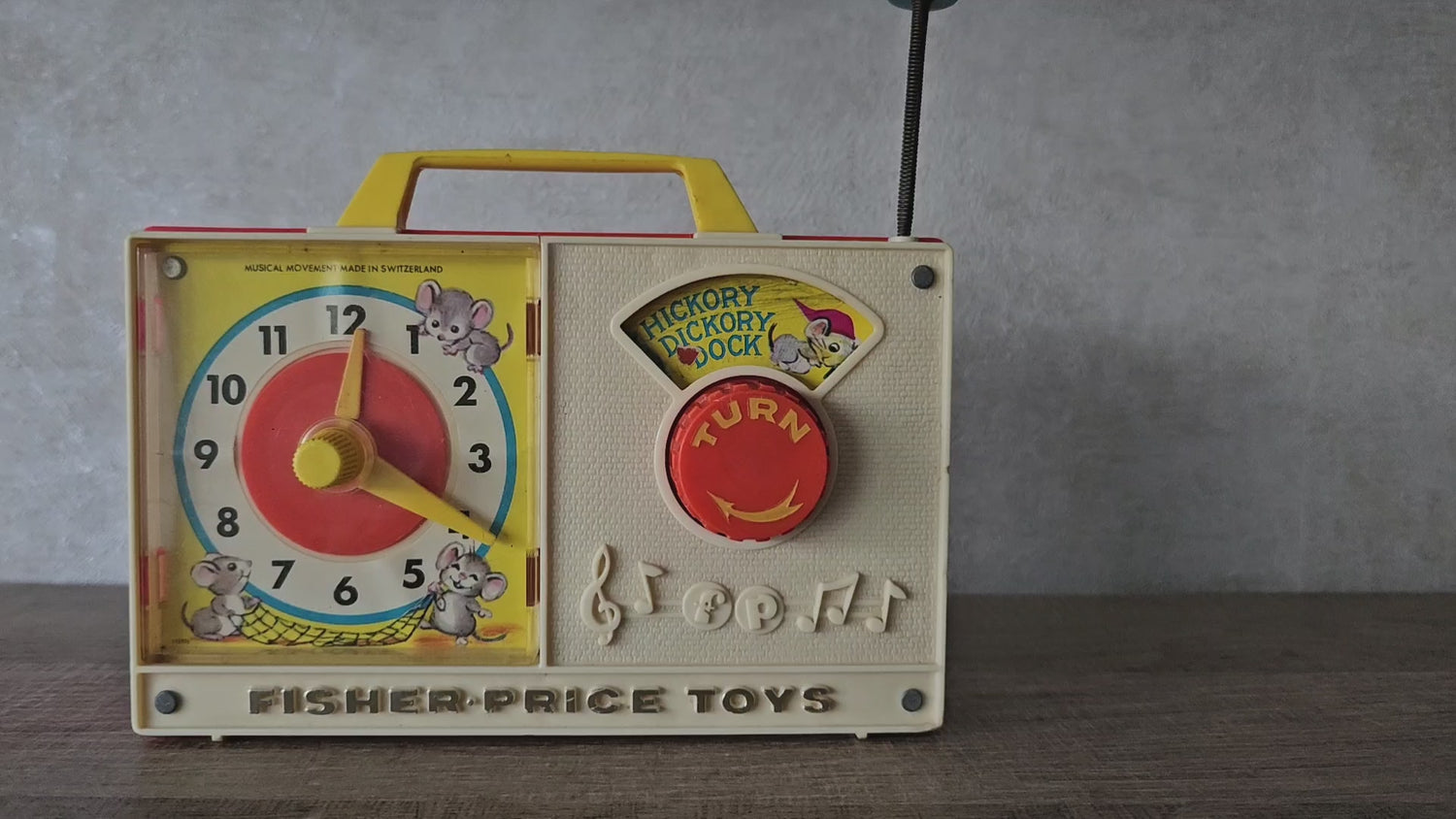 Fisher price vintage muziekdoosje met klok