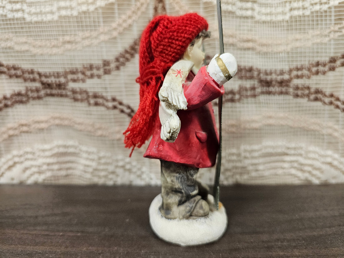 Beeldje jongen met ski’s winterdecoratie 11 cm