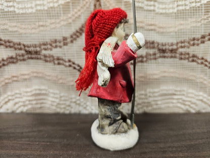 Beeldje jongen met ski’s winterdecoratie 11 cm