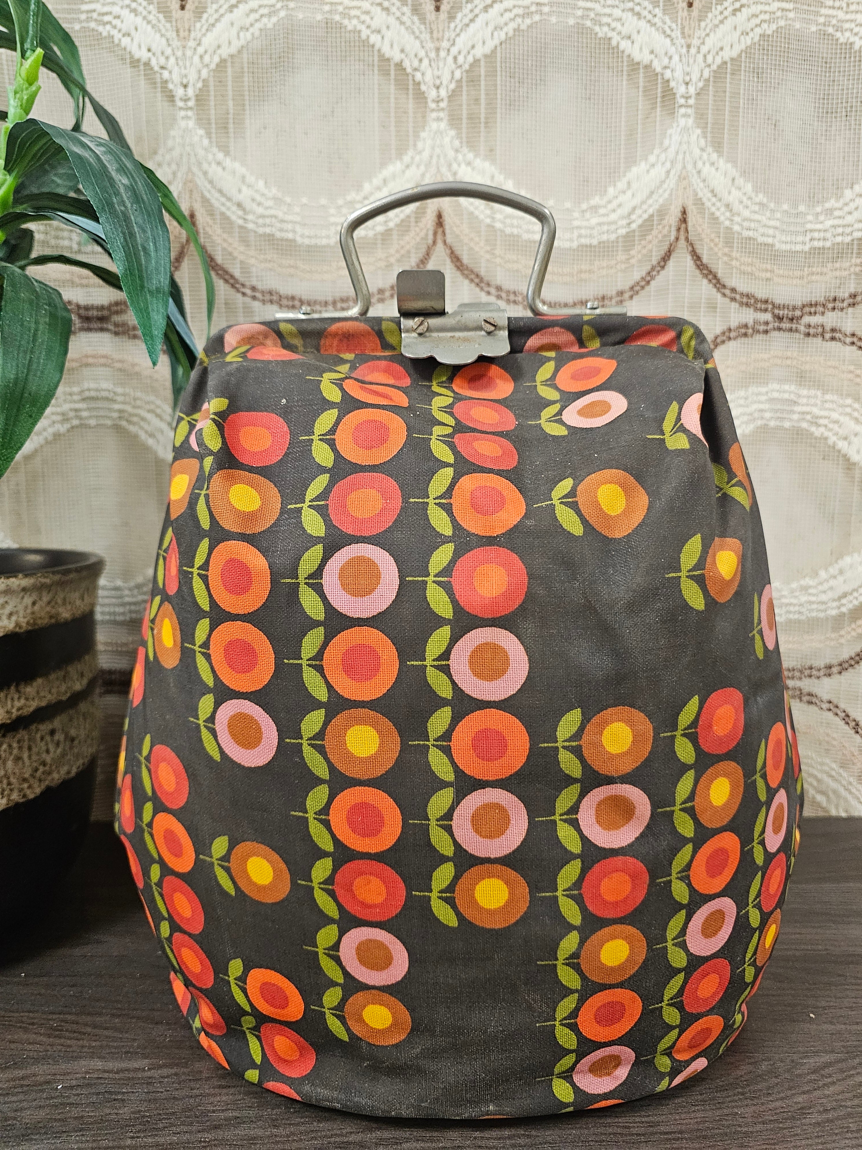 Van Nelle theebeurs met knip jaren 70 bruin met  bloemen