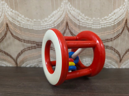 Vintage Ambi Toys rammelaar – rollend babyspeelgoed met kleurrijke ringen
