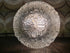Ronde vintage plafondlamp van helder glas met bloemreliëf en golvende rand