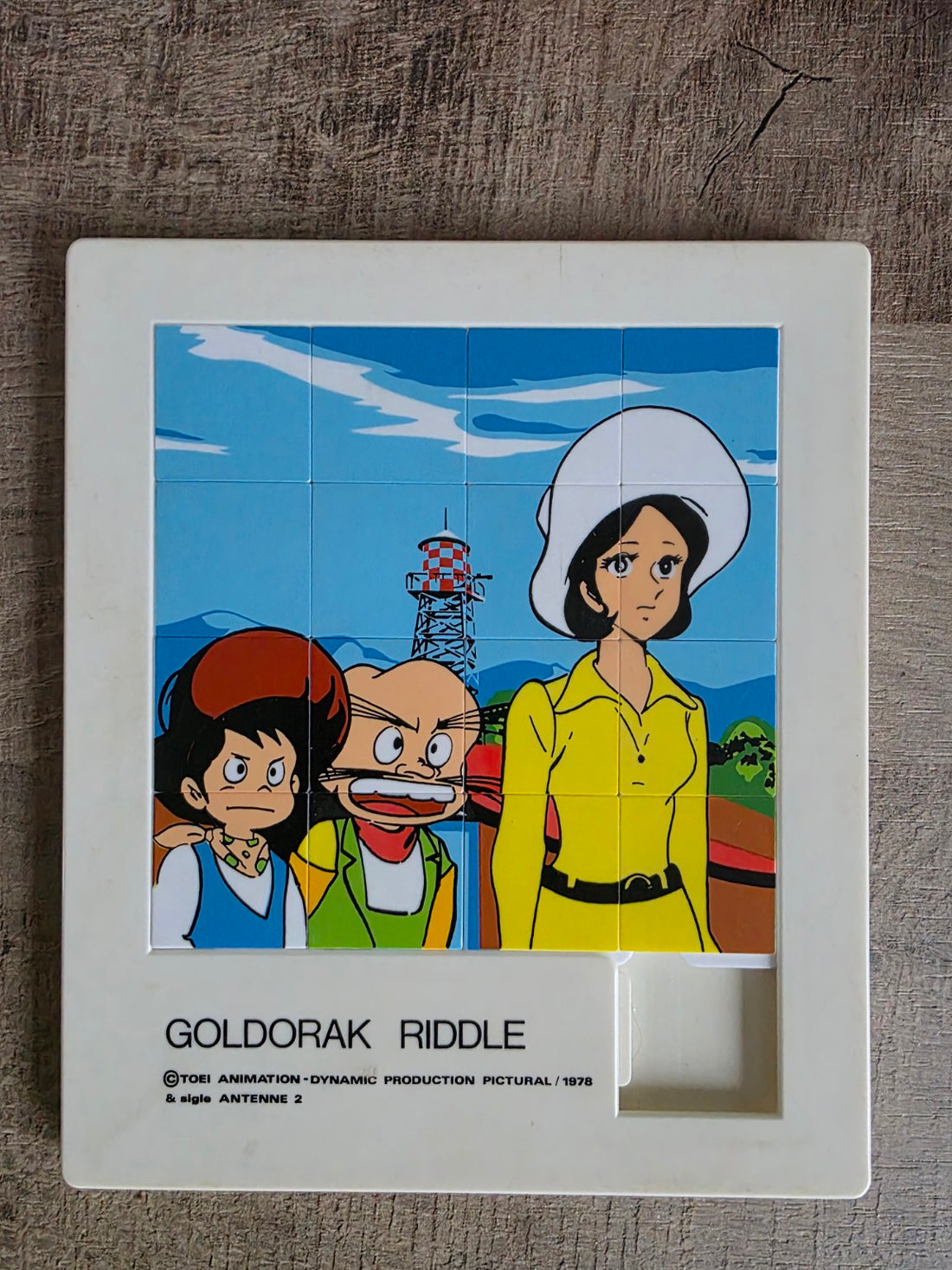 Goldorak Riddle schuifpuzzel met gekleurde afbeelding en witte kunststof rand