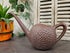 Vintage Vitri W. Germany gieter van 1 liter in bruin met lange schenktuit.