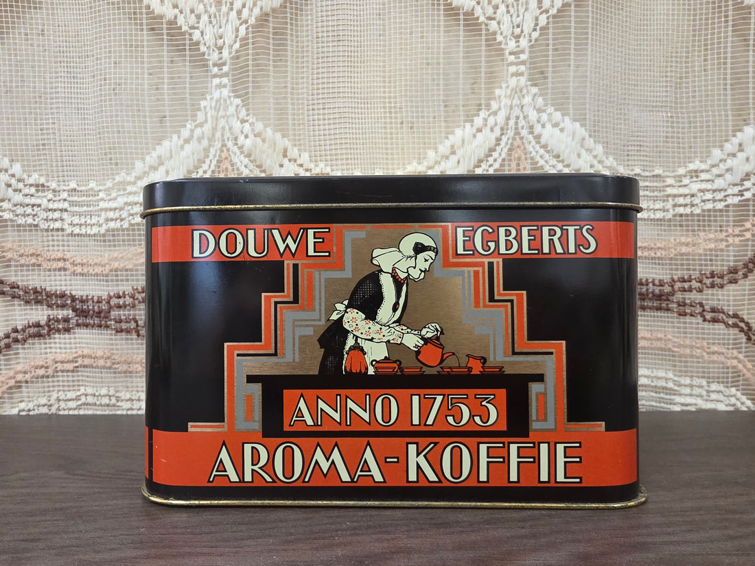 Zwart vintage Douwe Egberts Aroma-Koffie blik Anno 1753 met rode en goudkleurige details