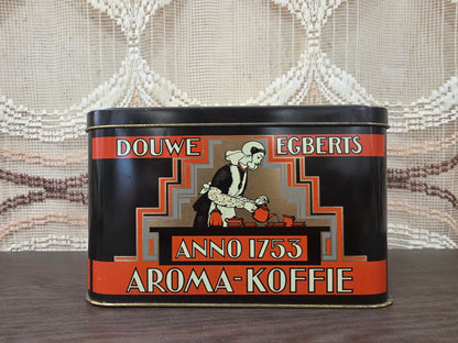 Zwart vintage Douwe Egberts Aroma-Koffie blik Anno 1753 met rode en goudkleurige details